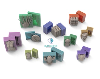 May include: Assortment of silicone molds for making candles. The molds are in various colors and shapes, including a hand, a skull, a cactus, a body, a moon, a cat, and a sphere. The molds are open and show the inside of the mold.