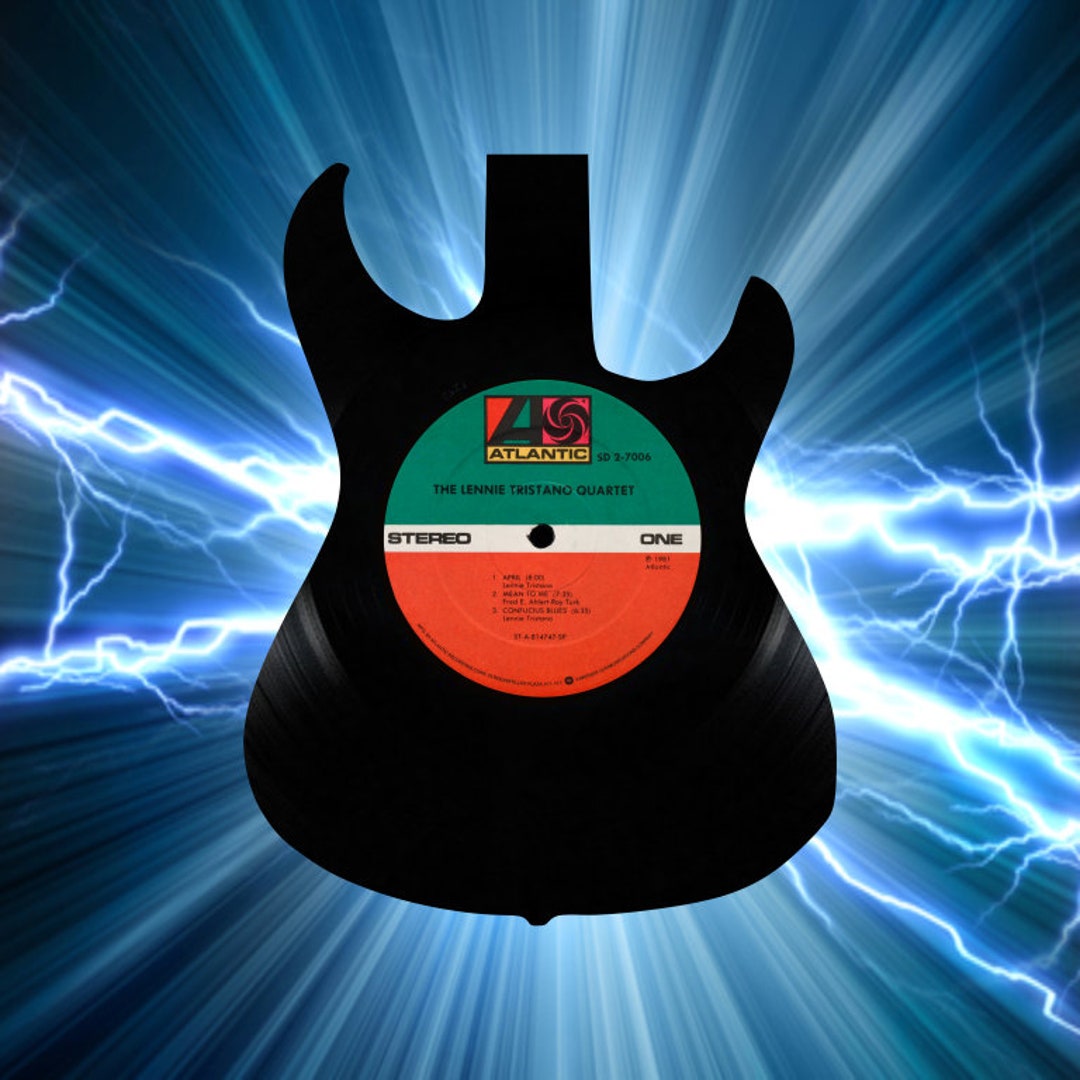 Arte de disco de vinilo de rock and roll con guitarra recortado de un ...