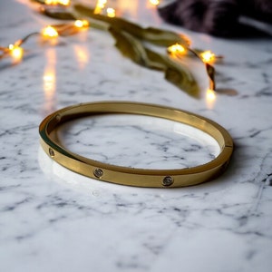 Bracelet en acier inoxydable doré pas cher Idée cadeau femme Bijoux pour femmes Cadeau Or Bague de mode S'orienter image 1