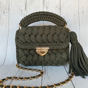 designer black bag with gold chain