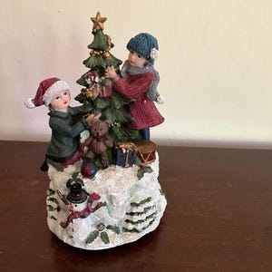 Vintage Trimming the Tree Christmas Music Box, Plays Silent Night.