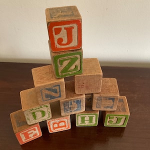 Antieke houten alfabetblokken