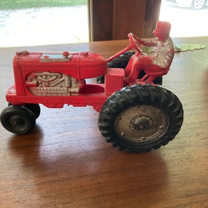 Red Auburn Rubber Toy Tractor #572 from 1950s Rare size.