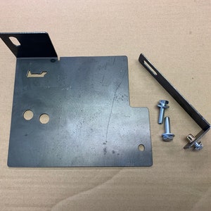 Montero gen2 under hood bracket.