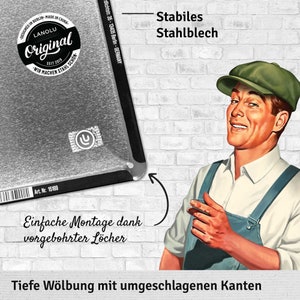 May include: A metal sign with the text "Original" and "LANOLU" in a circular design. The sign has the text "DESIGNED IN BERLIN - MADE IN CHINA" and "WIR MACHEN STAHL SCHON". The sign also has the text "Art. Nr. 15169".