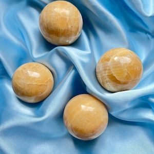 orange calcite sphere | polished orange calcite | orange calcite crystal ball | orange sphere