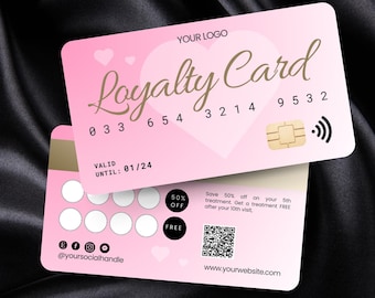 May include: A pink loyalty card with a heart design and the words "Loyalty Card" in gold script. The card includes a magnetic stripe, a chip, and a contactless payment symbol. It also features a QR code and social media icons.