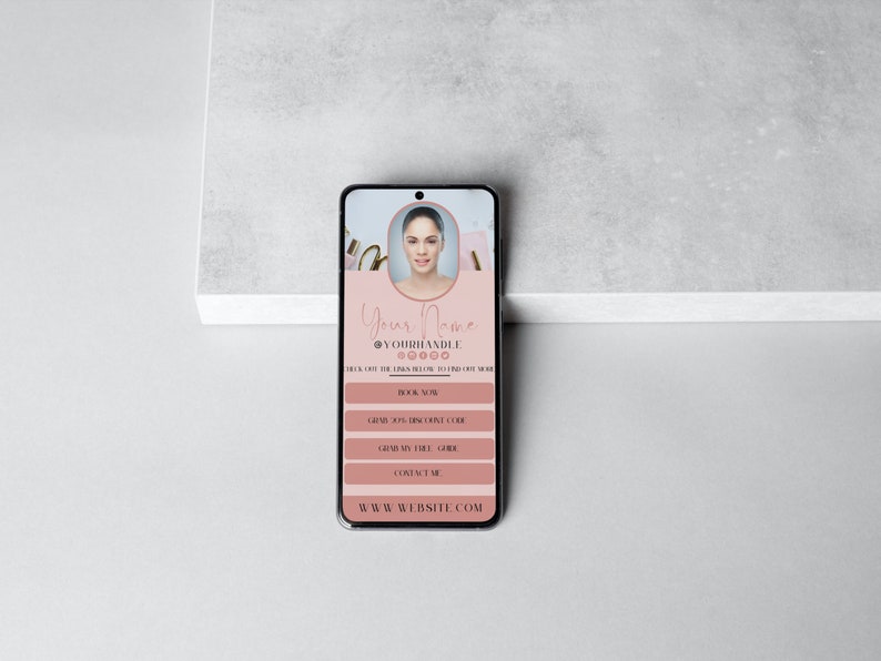 May include: A pink and white mobile phone screen displaying a business card with a woman's headshot, the text "Your Name", and social media handles. The card also includes the text "Book Now", "Gift Card", "Gift My Skill", and "Contact Me". The bottom of the screen displays the text "www.website.com".