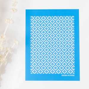 May include: A blue stencil with a white geometric pattern. The stencil has the text "Echo & Tone" printed in white at the bottom.