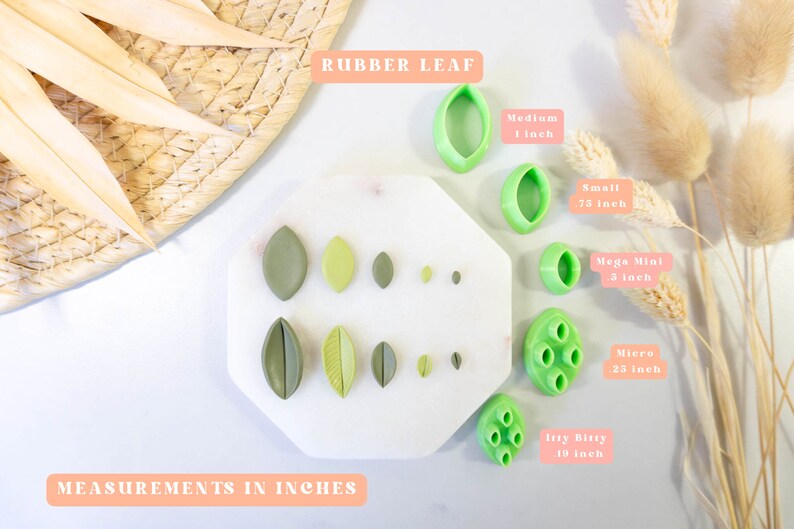 May include: A set of 10 green rubber leaf cutters in various sizes, including Itty Bitty (1/9 inch), Micro (1/4 inch), Mega Mini (3/8 inch), Small (3/4 inch), and Medium (1 inch). The cutters are arranged on a white surface with a white background.
