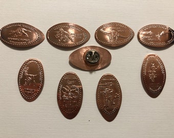 Dino Park Pressade Penny Pins - Set med 8 delar