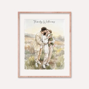 May include: Watercolor portrait of a family of three in a rose gold frame. The family is embracing in a field of tall grass. The text "Family Williams" is written in cursive at the top of the image.