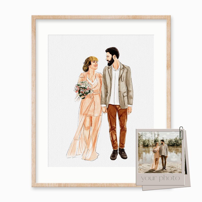 May include: A watercolor illustration of a couple in wedding attire. The woman is wearing a peach dress and holding a bouquet of flowers. The man is wearing a gray suit and brown pants. The illustration is framed in a light wood frame.