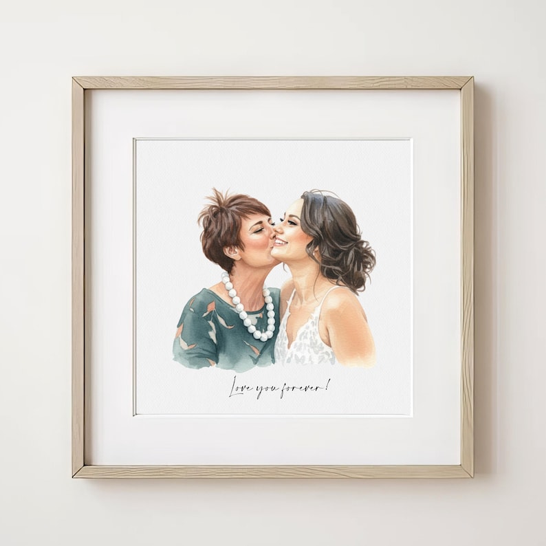May include: Watercolor portrait of two women kissing, framed in a light wood frame. One woman wears a green top and a pearl necklace. The other woman wears a white dress. The text "Love you forever!" is written below the image.