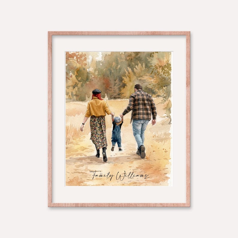 May include: A framed watercolor print depicts a family of three walking on a path. The parents hold hands with their child. The print has a rose gold frame and the text "Family Williams" is at the bottom.