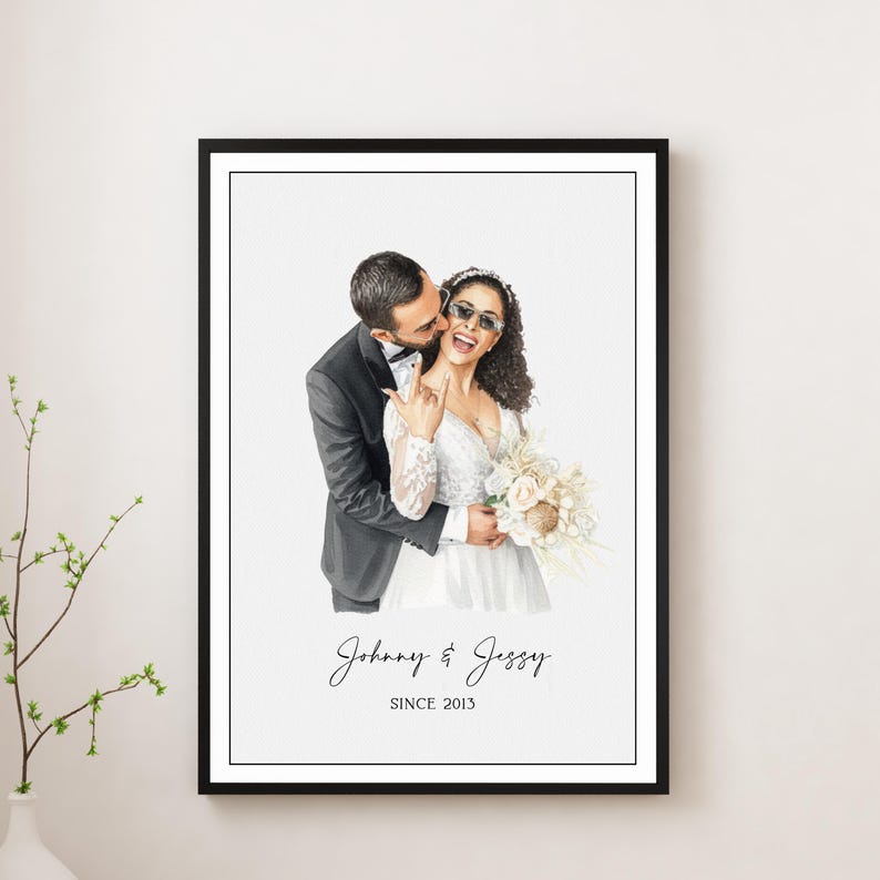 May include: A framed watercolor portrait of a couple on their wedding day. The man in a black tuxedo kisses the woman, who wears a white wedding dress and sunglasses. The text "Johnny & Jessy SINCE 2013" is below the couple.
