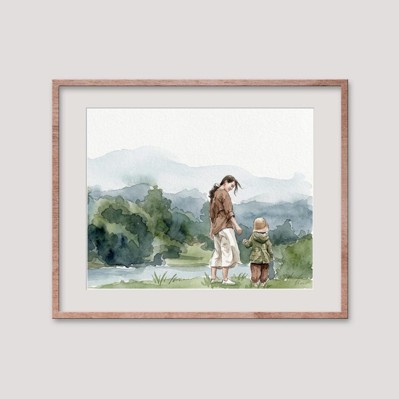 May include: Watercolor print of a mother and child walking in a park. The artwork features a woman in a brown shirt and white pants, and a child in a green jacket and brown pants. The background shows a lake, trees, and mountains.