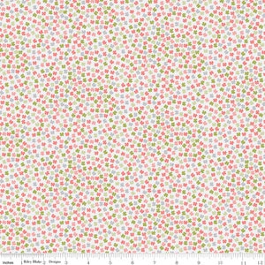 May include: White fabric with a repeating pattern of small green, pink, and gray four-leaf clovers.