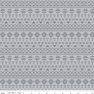 May include: A gray and white patterned fabric with a repeating geometric design. The pattern includes circles, stars, hearts, and triangles. The fabric is suitable for quilting, crafts, and apparel.