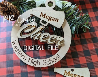 May include: A wooden Christmas ornament with the name "Megan" and the word "Cheer" cut out. The ornament is in the shape of a circle with the words "Western High School" around the edge. A small megaphone with the name "Megan" is also included. The words "Digital File" are also present.