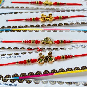 Set of 4 Children&#39;s Rakhee Car Rakhee, Bike Rakhee for Hindu Festival Raksha Bandhan Dora Rakhadi Rakhee Beaded Wrist Band Red Dora Rakhadi