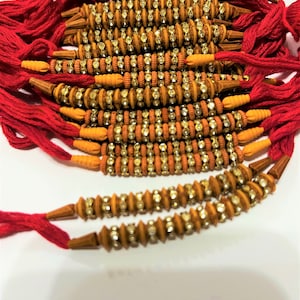 Set of 4 Rakhi for Hindu Festival Raksha Bandhan Dora Rakhadi Rakhee Beaded Wrist Band Red Dora Red Rakhadi