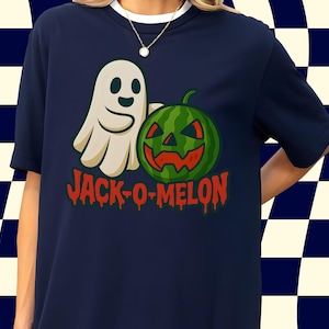 May include: Navy blue t-shirt featuring a cartoon ghost and a carved watermelon with a smiling face. The text "JACK-O-MELON" is printed in red, dripping letters below the images. The shirt has a white collar.