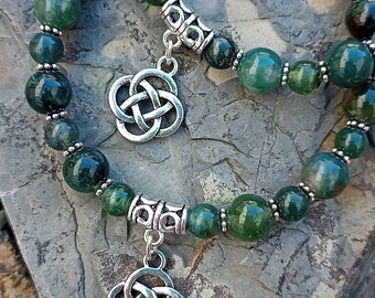 Moss Agate handmade bracelet with Celtic eternal knot charm. With natural stone beads and tibetan silver, perfect gift for someone special.