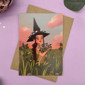 Postal de bruja herbácea: Ilustración A6 con un toque natural y mágico de pradera.