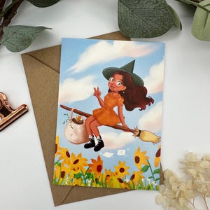 Bruja con carta sobre un campo de girasoles - Postal veraniega A6