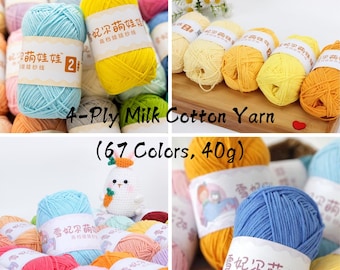 Può includere: Assortimento di filato di cotone di latte a 4 fili in vari colori, ogni gomitolo è di 40 grammi. Il filato è etichettato in cinese con il testo "雪妃尔萌娃娃 高档娃娃纱线" che si traduce in "Filato per bambole di alta qualità per bambini carini delle fate di neve".