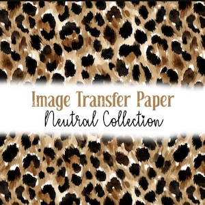 May include: Image transfer paper with a neutral leopard print design. The pattern features black spots and brown and tan brushstrokes. The text "Image Transfer Paper Neutral Collection" is displayed in a white banner.