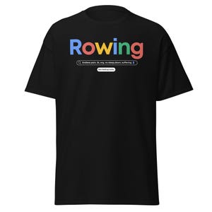 May include: Black t-shirt featuring the word "Rowing" in blue, red, and green. A search bar below the word includes the text "Endless pain, 2k, erg, no sleep, down, suffering." The phrase "Not feeling lucky" is below the search bar.