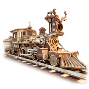 May include: A wooden model of a vintage steam locomotive with intricate details, including a large smokestack and a decorative deer antler design on the top. The model is on a wooden track.