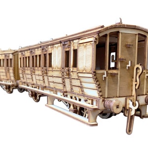 May include: A wooden model train set with multiple cars, featuring a detailed design with intricate wood grain and a brown finish.