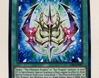 yugioh rank up magic cards YU-GI-OH! Rise Rank-Up-Magic Raidraptor's Force - PHNI-EN056 - Super Rare while this card is in your GY (except during the Damage Step) The Phantom Knights' Rank-up-magic Requiem