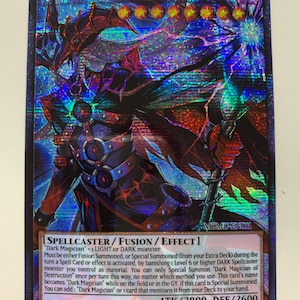 May include: A holographic trading card featuring the character "Dark Magician of Destruction." The card has a dark color scheme with red, blue, and purple accents. Text includes card type, effect details, and attack/defense stats. The card is a collectible item.