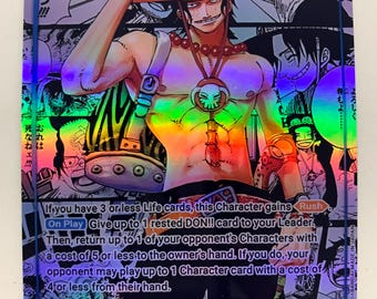 May include: Holographic trading card featuring Portgas D. Ace from the Whitebeard Pirates. The card has a blue border and includes Japanese text and character abilities. The character is depicted with an orange hat and necklace.