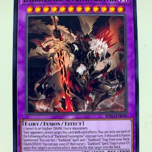 May include: A trading card featuring the character "Darklord Eveningstar." The card has a purple border with gold stars and a detailed illustration of a dark fantasy figure wielding a glowing red sword. The card text includes game effects and stats.