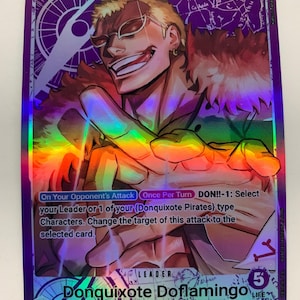 May include: A holographic trading card featuring Donquixote Doflamingo from "The Seven Warlords of the Sea/Donquixote Pirates." The card has a purple background with a portrait of the character, text, and a 5000 special rating.