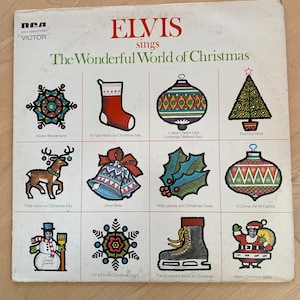 Elvis signs The Wonderful World of Christmas