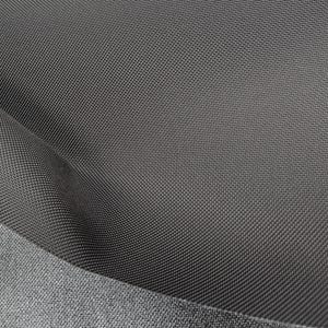 May include: Close-up of a dark gray fabric with a textured weave. The fabric has a subtle sheen and a smooth, soft feel.
