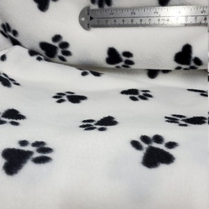 Fleece Fabric paws print black/white  Fleece Polar By The Yard 60&quot; Wide