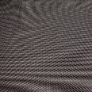 May include: Close-up of a dark gray fabric with a textured weave. The fabric has a subtle sheen and a smooth, even surface.