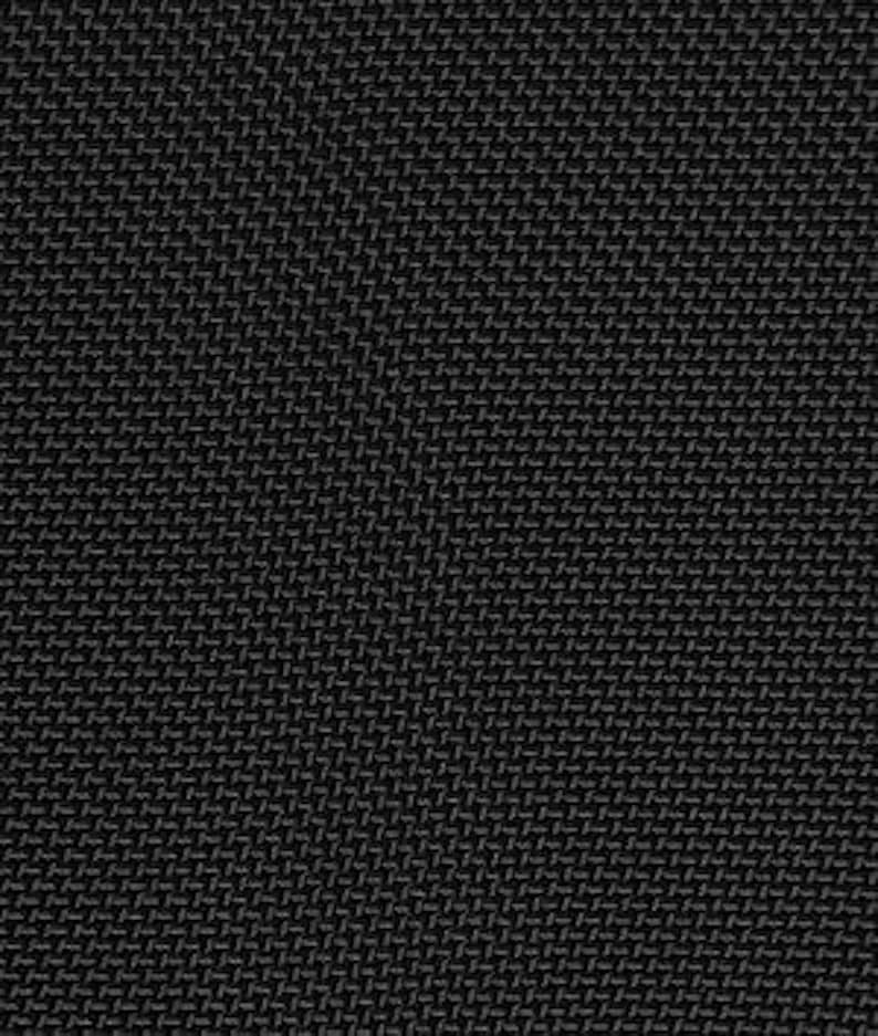 May include: Black fabric with a textured woven pattern.