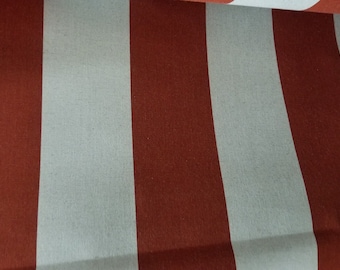 May include: Red and white striped fabric with a subtle texture. The fabric is folded in half, showing the stripes running vertically.