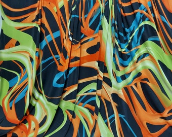 Venezia Spandex 2 Ways Stretch One Side Border Abstract Design Fabric  Black / Multi color, Width 58 sold by yard