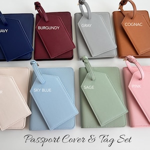 May include: Eight passport cover and luggage tag sets in various colors including navy, burgundy, gray, cognac, oyster, sky blue, sage, and pink. Each set features a rectangular passport holder and a matching luggage tag with a strap. The text Passport Cover & Tag Set is displayed at the bottom.