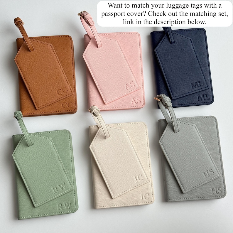 May include: A collection of six passport covers and luggage tags in various colors: brown, pink, navy, green, cream, and gray. Each set includes a passport cover and a matching luggage tag, with initials embossed on both items.