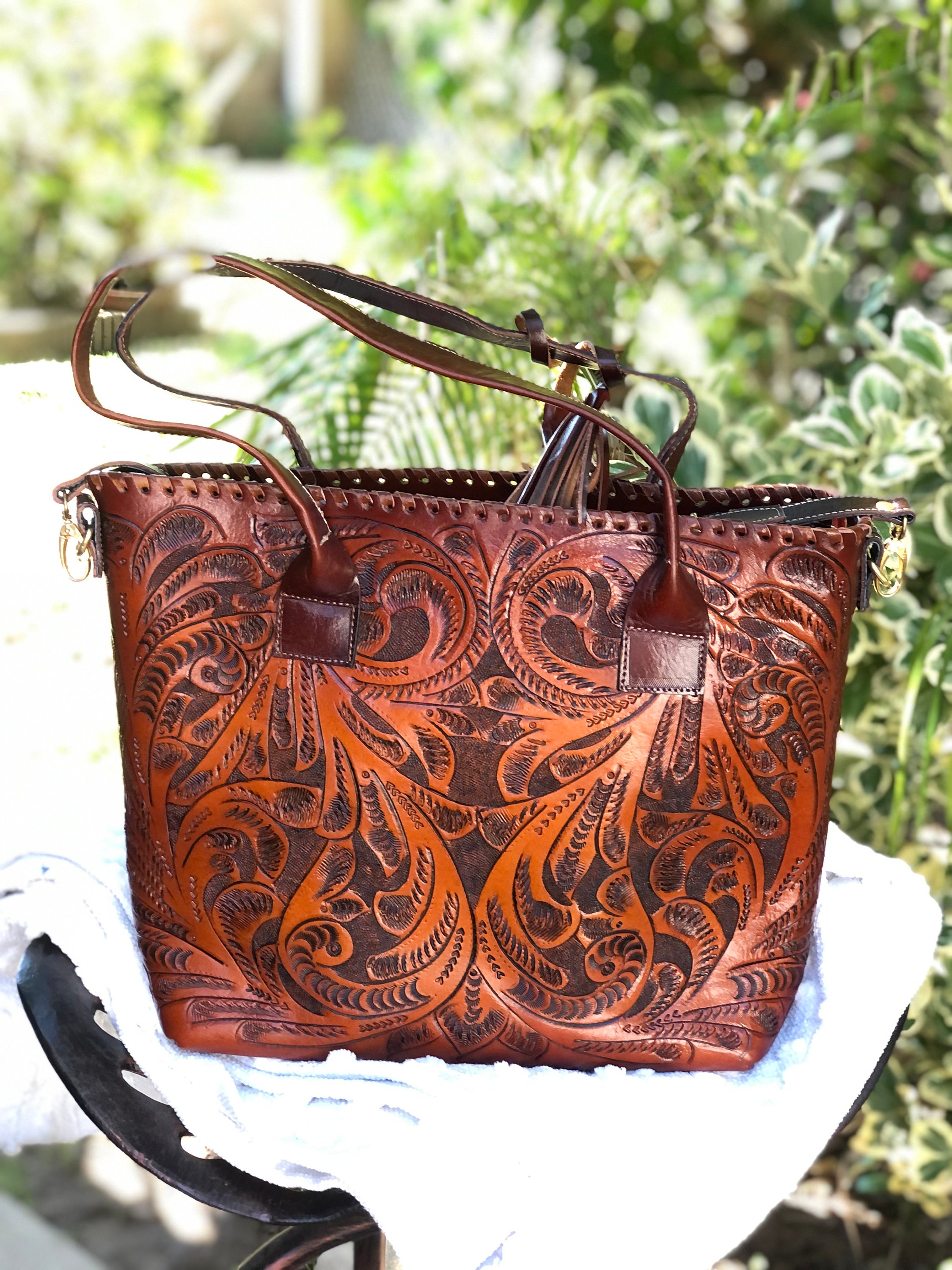 hand stitched leather bolsa